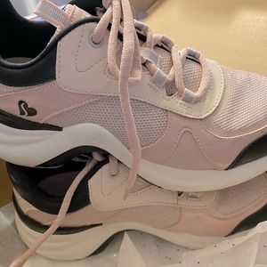 These are Pink sparkly size 8 Womans